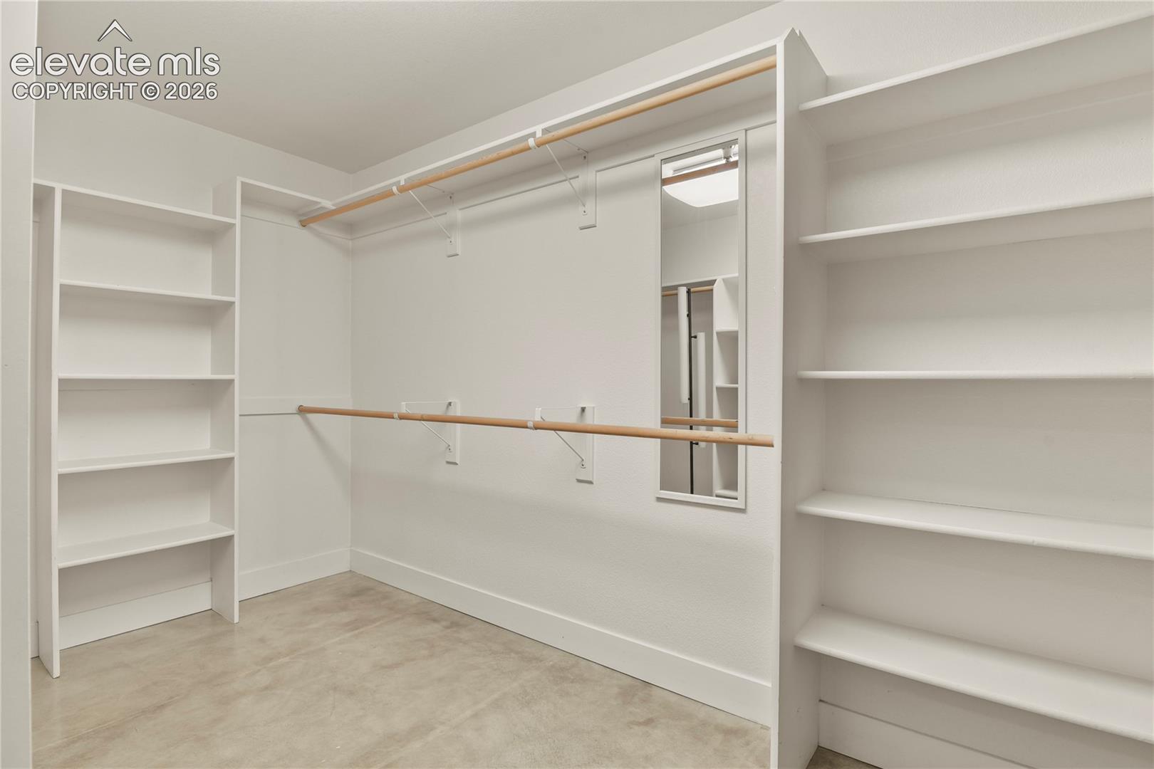 Massive walk-in closet directly off primary bedroom