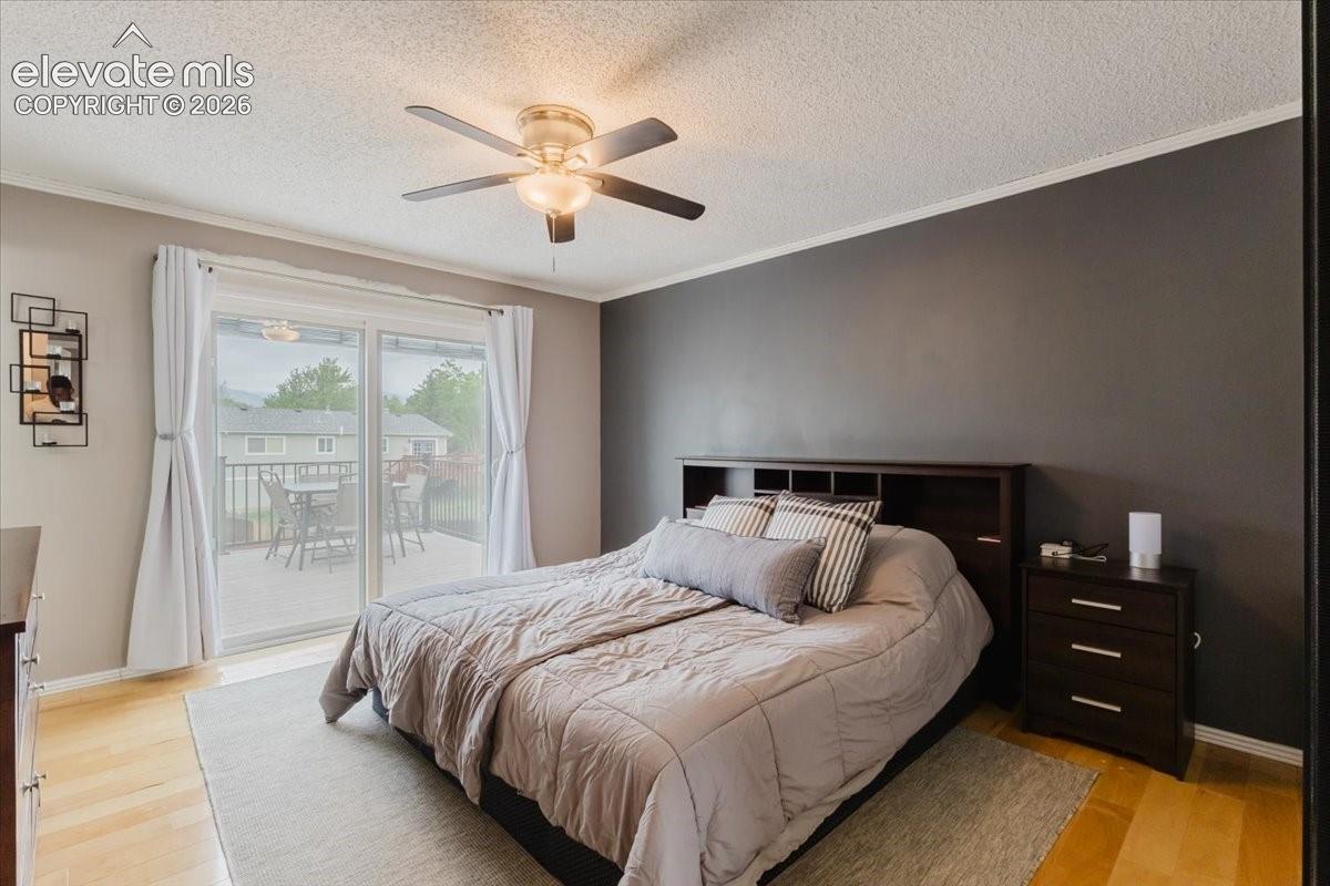 Primary bedroom with walkout to deck