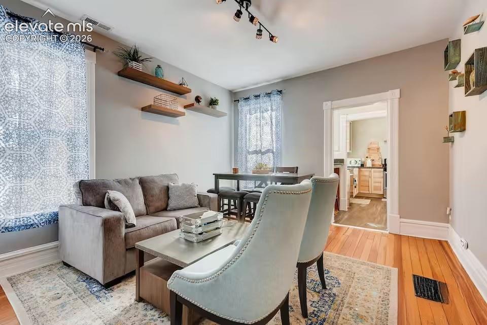 Original wood floors and victorian architecture blend well with modern touches.