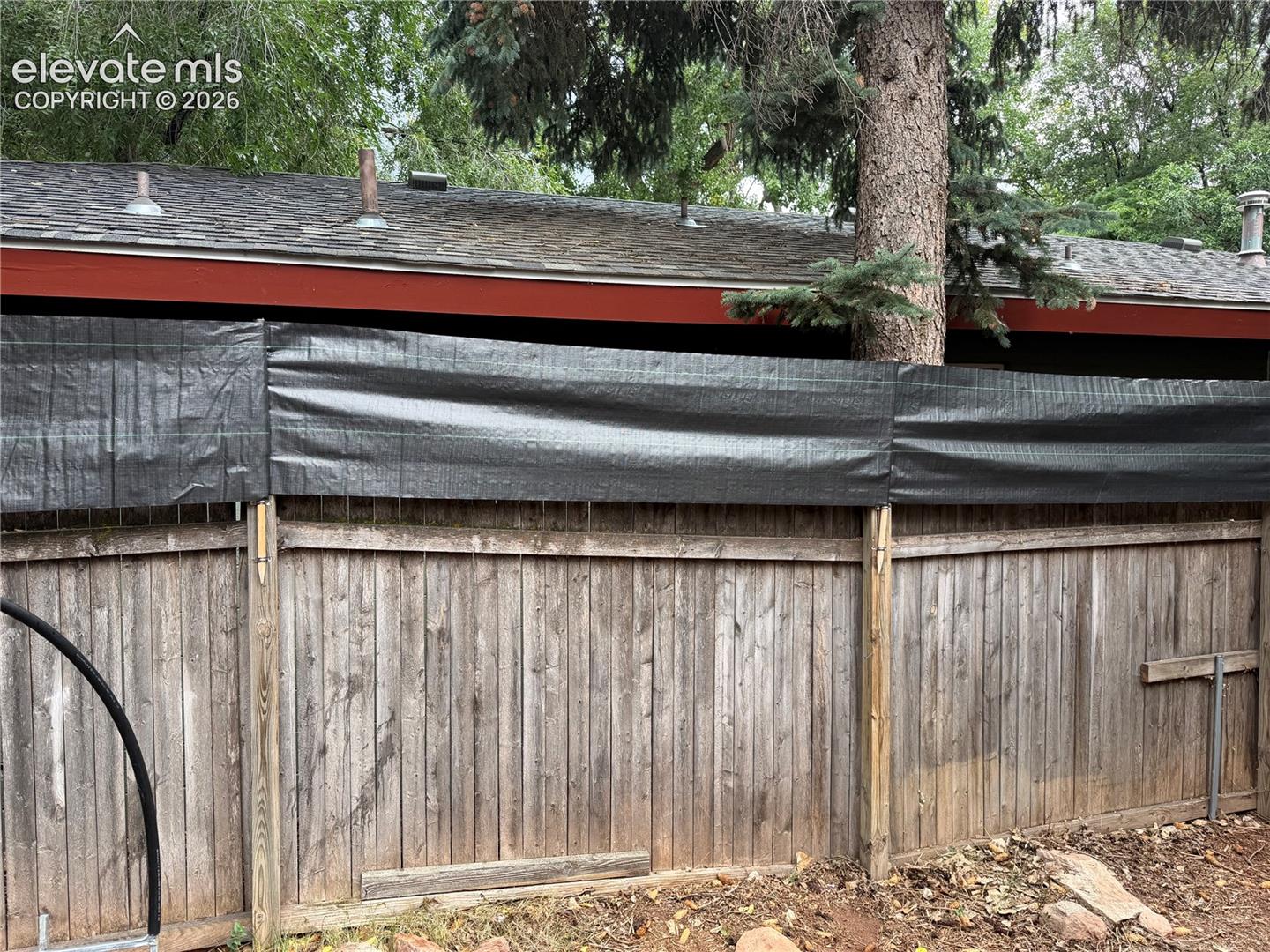 Private fenced backyard.