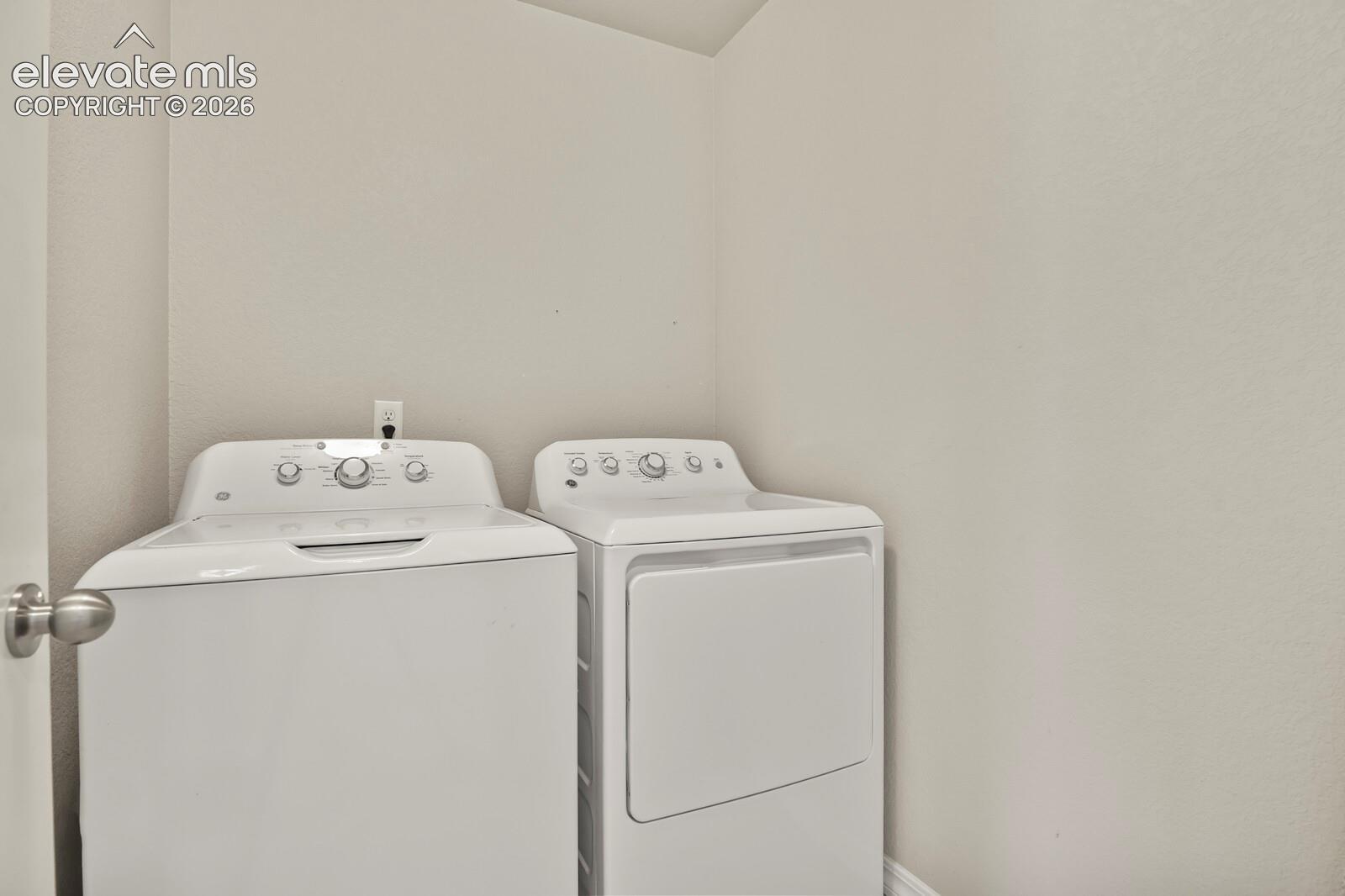 Upstairs laundry where all the clothes are