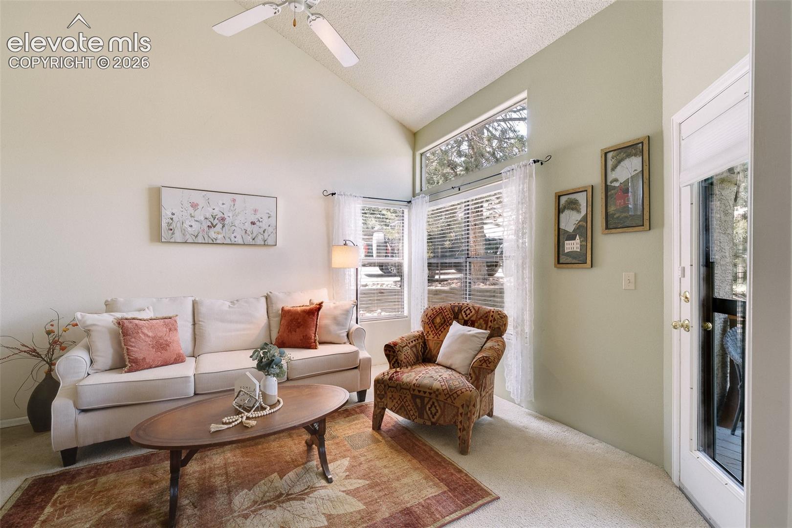 Living Room with door leading out to the composite deck.