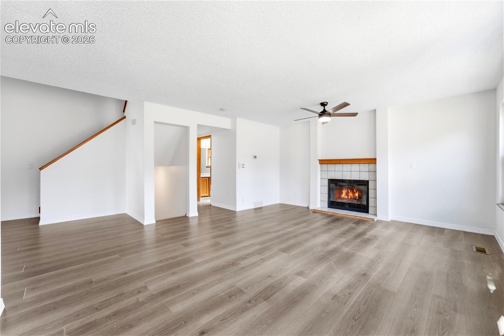 Dining area with new LVP flooring, and additional living room or family room