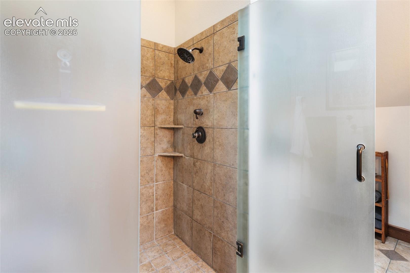 Primary bathroom, shower. 