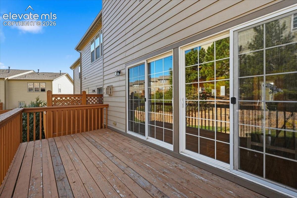 Wood deck with railing and lattice detailing