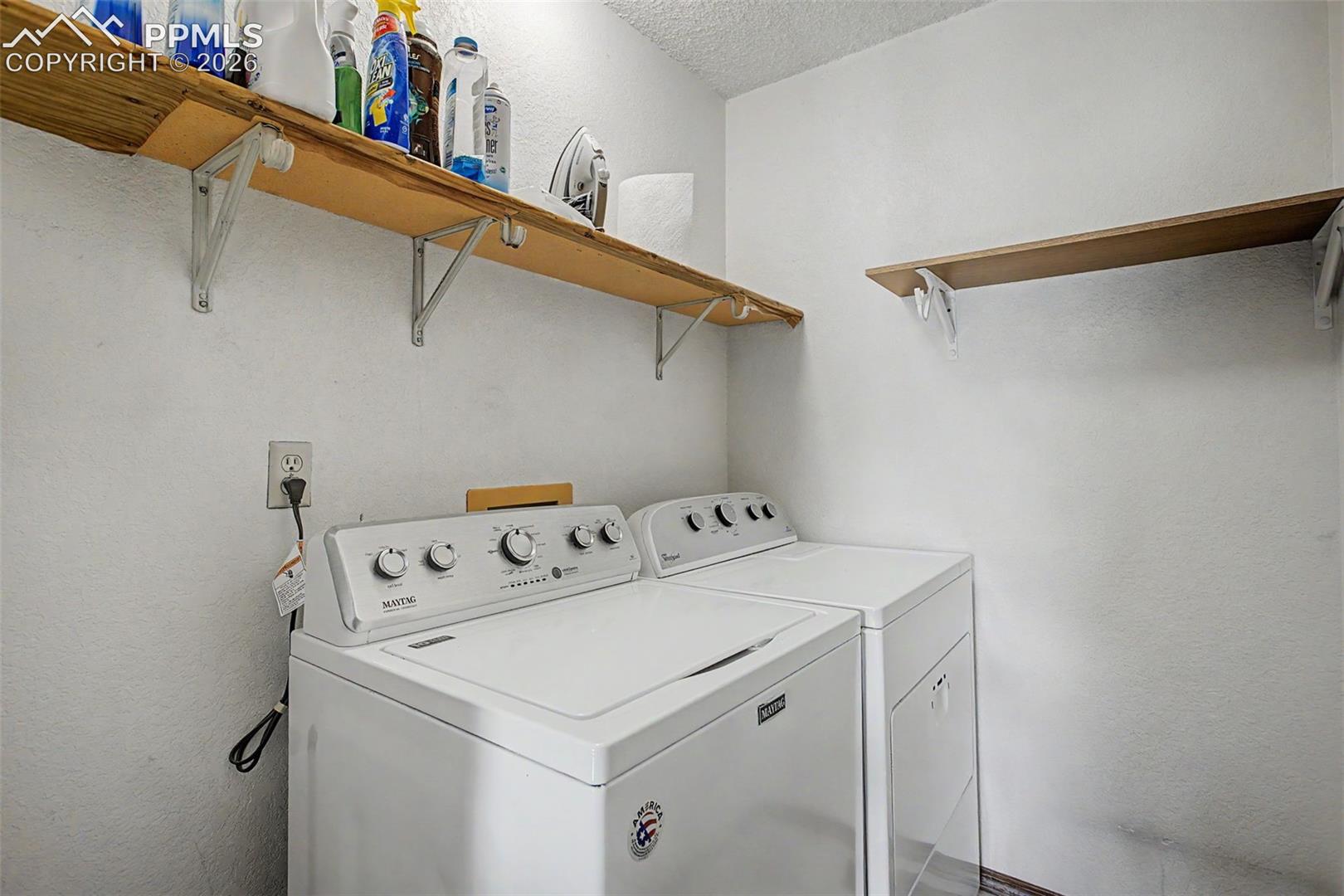 Laundry room is on the upper level.