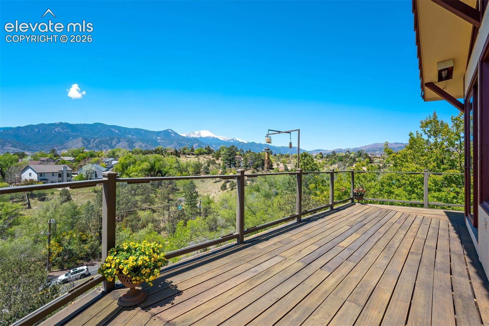 Brazillian wood deck, with glass panels looking north.