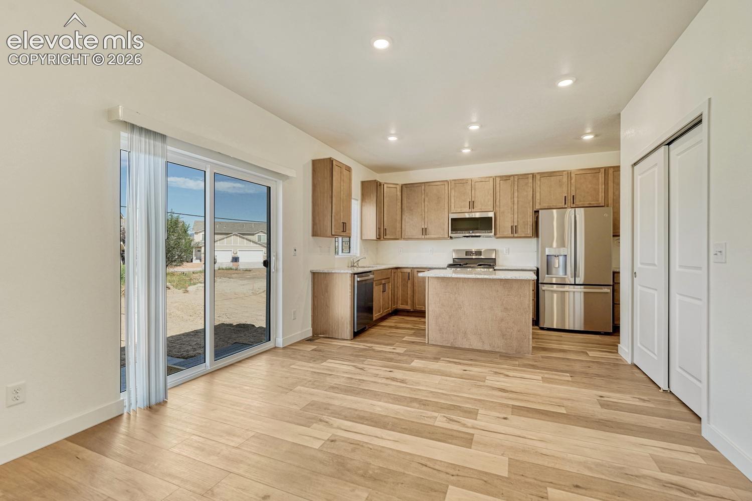 Generous ceiling can light placement