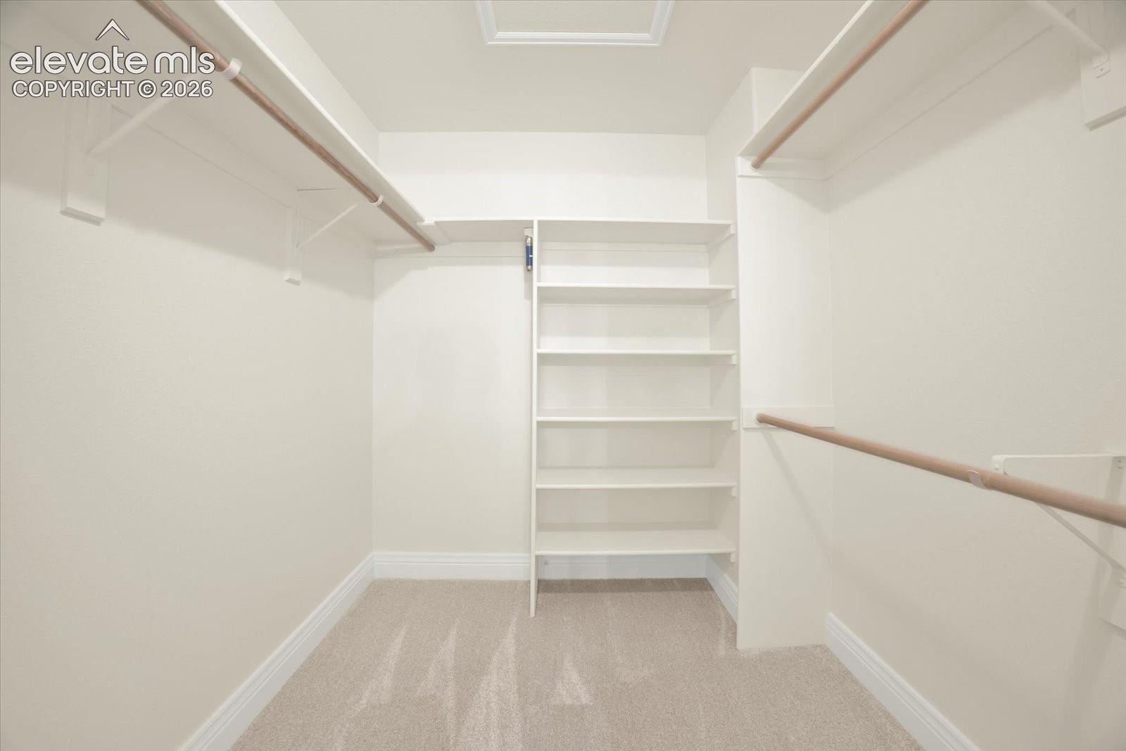 Primary walk-in closet.