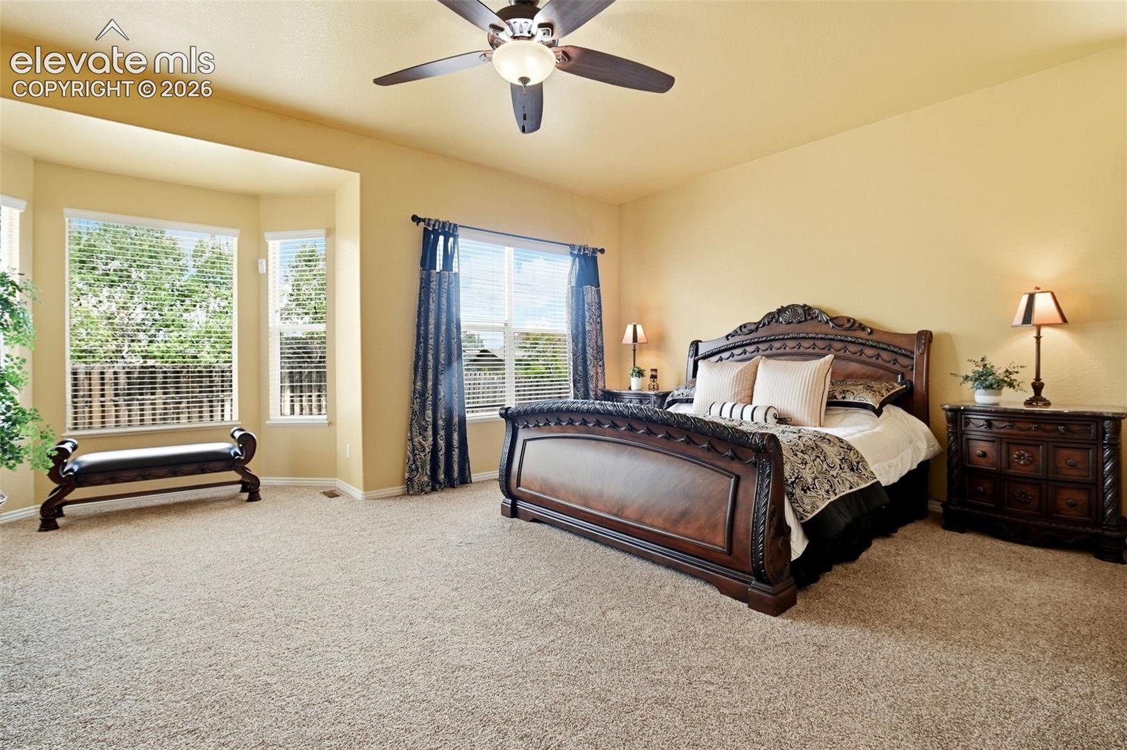 Soaring ceilings and bright bay window fill the suite with natural light.  Can you say "ultimate comfort".