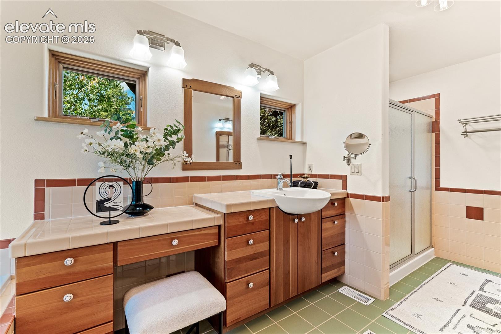 Primary bathroom photographed June 2026