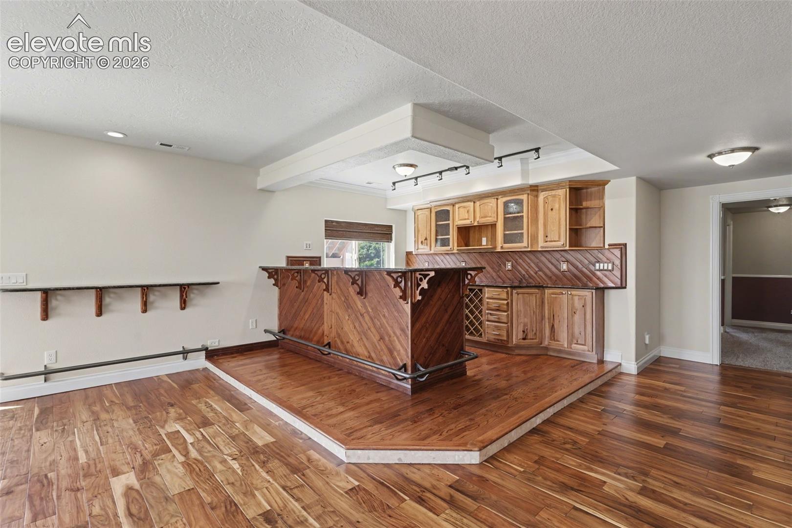 Basement Walk-Out Family Room w/Pellet Stove and Vintage Bar