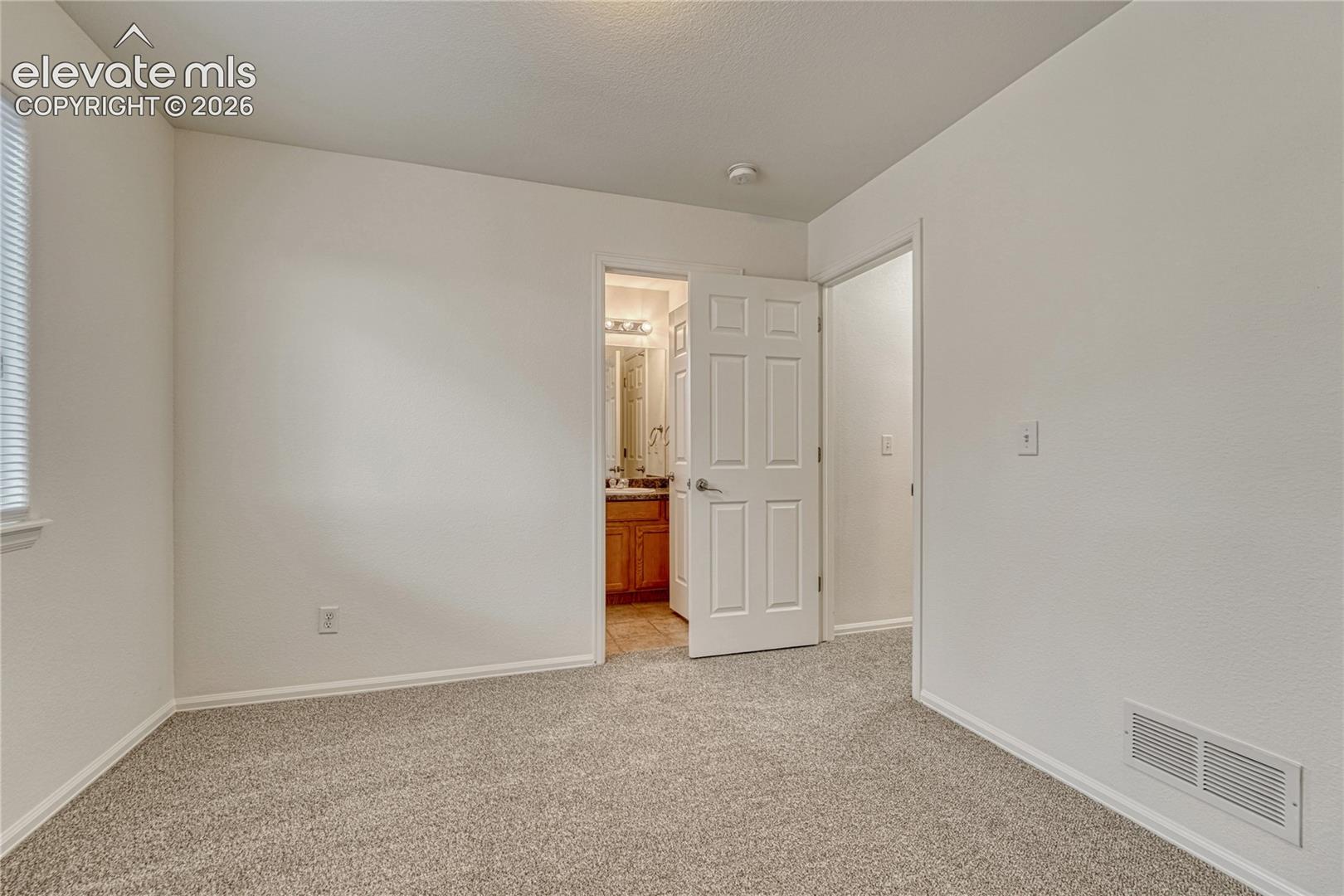 Second of two additional upstairs bedrooms...