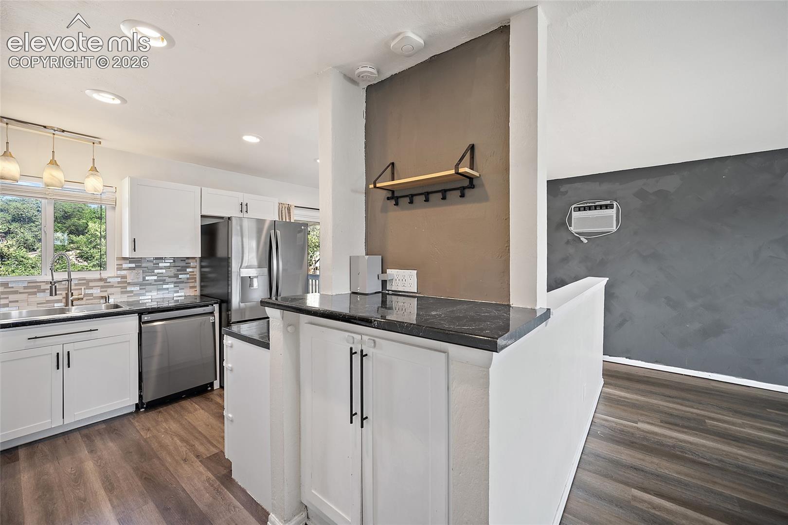 Kitchen with white cabinetry