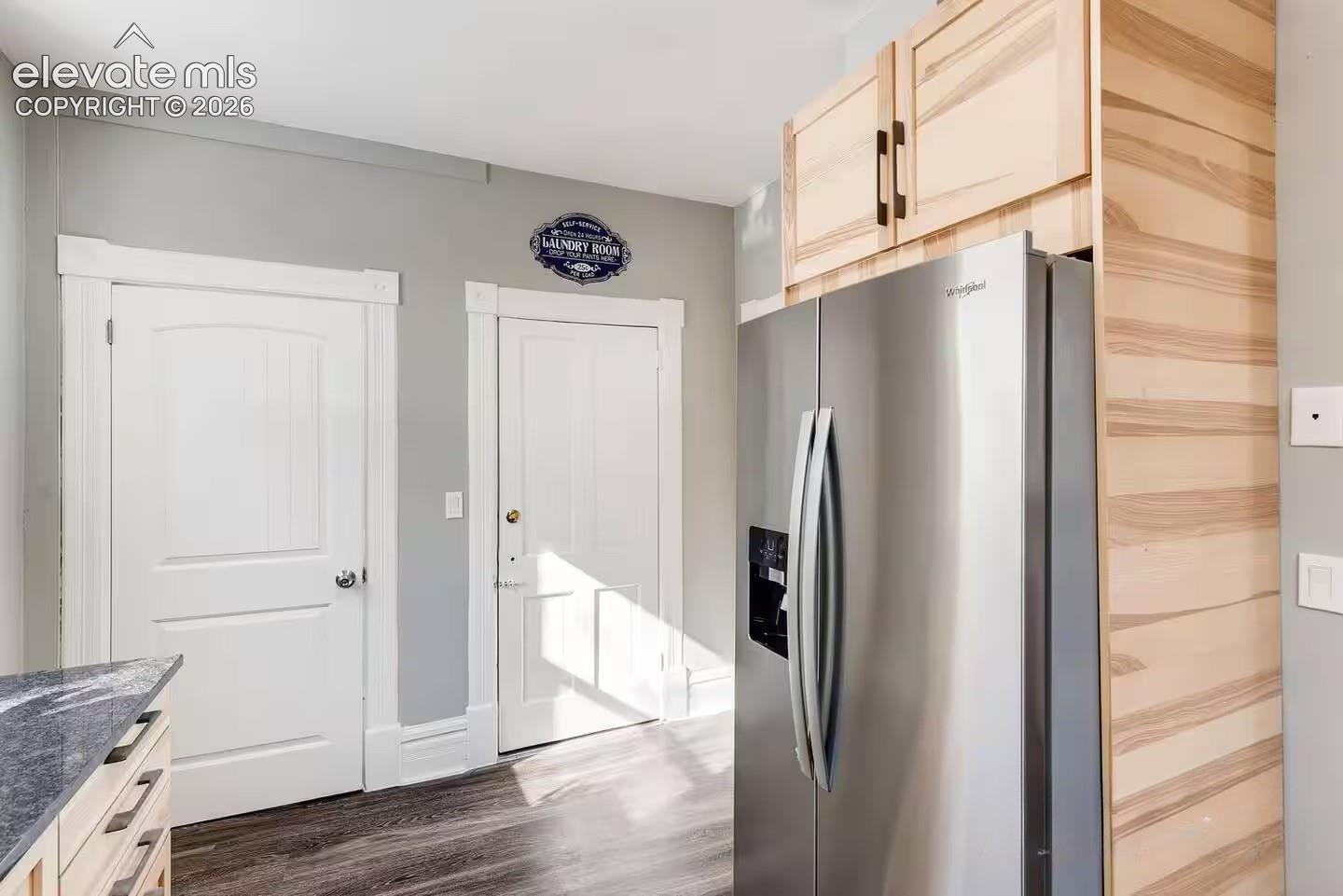 Access to laundry and 1/2 bath off of kitchen.