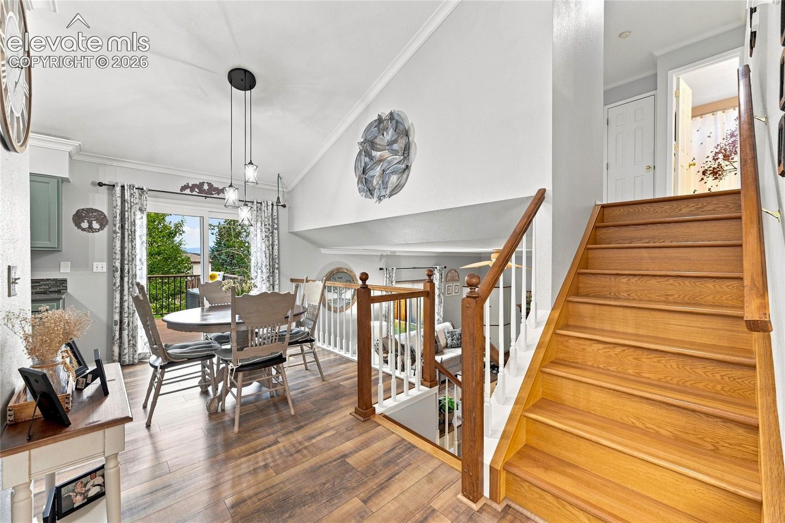 Spacious dining area with walkout to deck