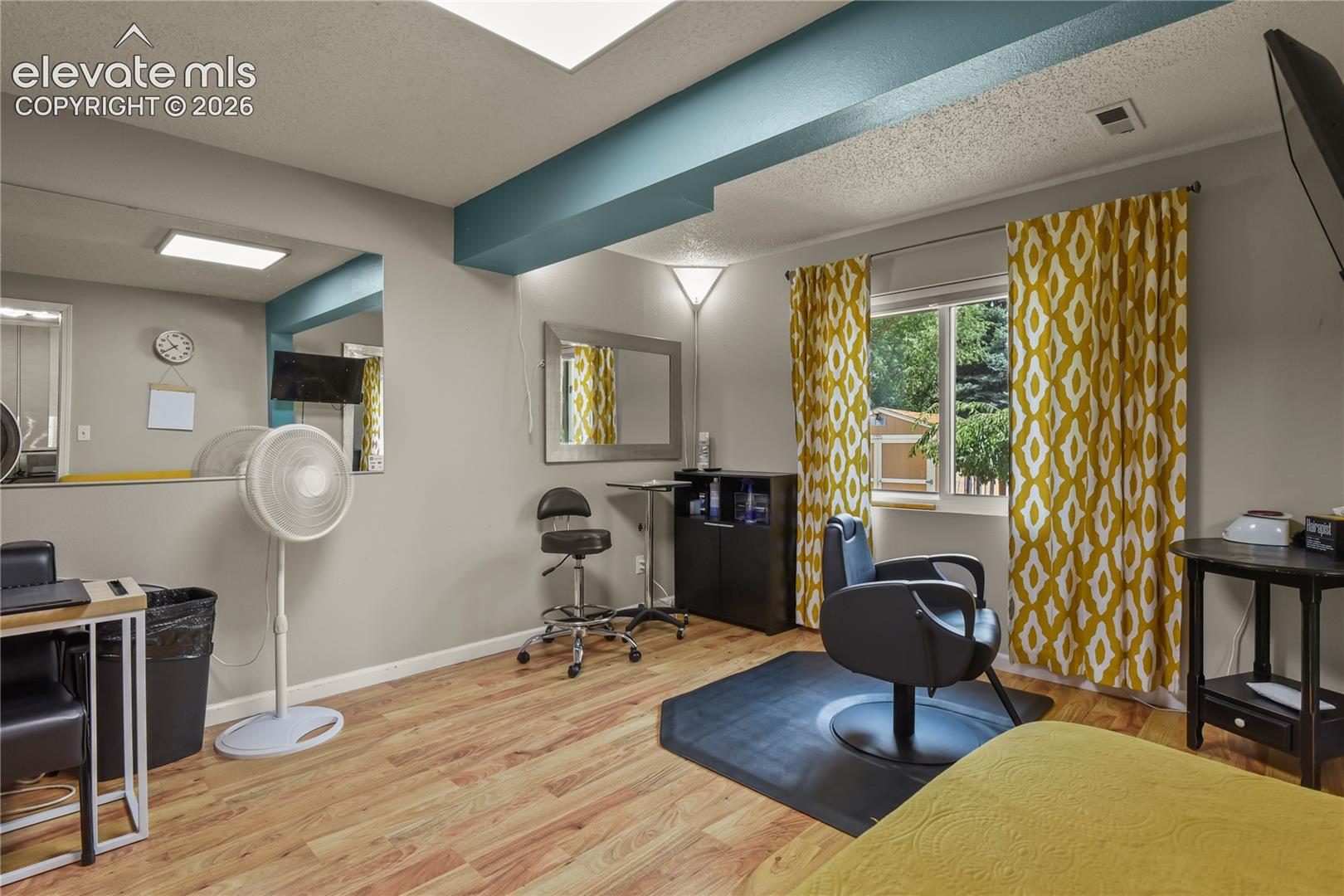 Bedroom currently used as a salon studio 