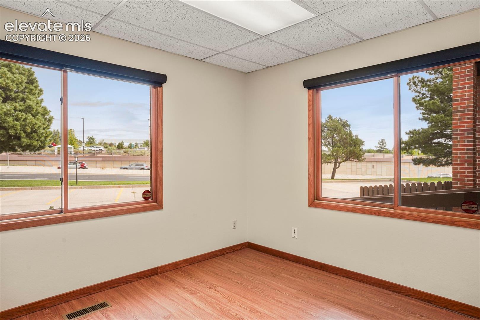 West Side office #6 - North end. There is an entrance/exit from West side to back of building.