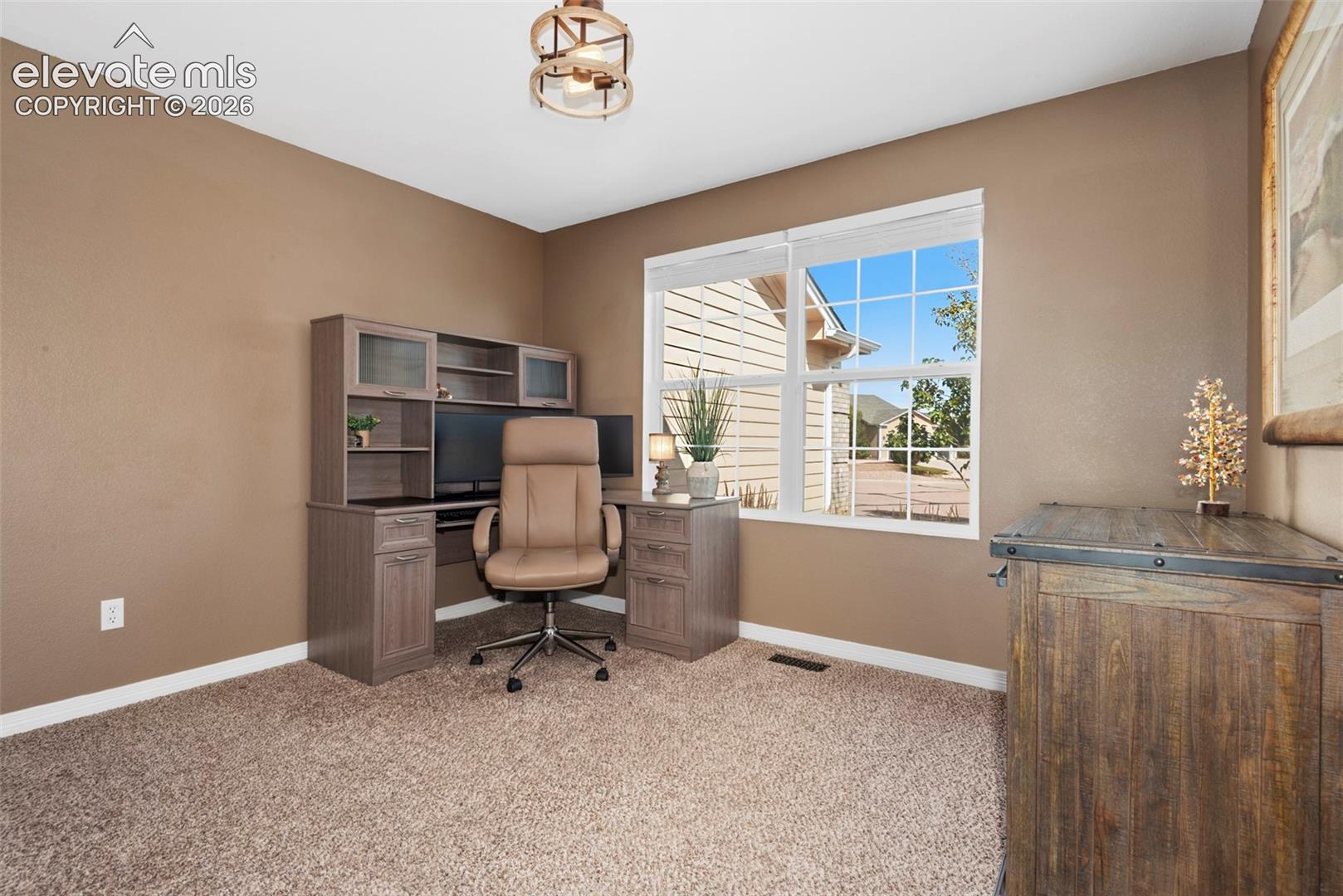 Beautiful Walk-in shower with Stone-finish Tile Surround and Glass Enclosure, Vaulted Ceiling, Arched Closet 

Doorway, Private Toilet Area