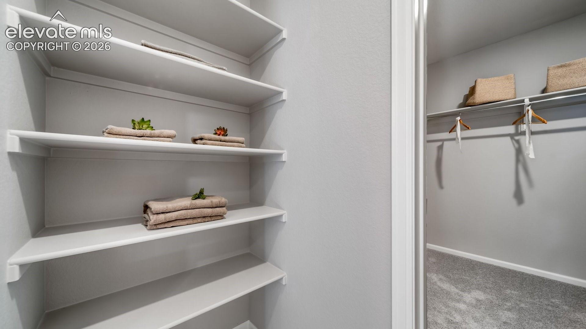 Built-in shelving system with white finishes
Photos of a model home