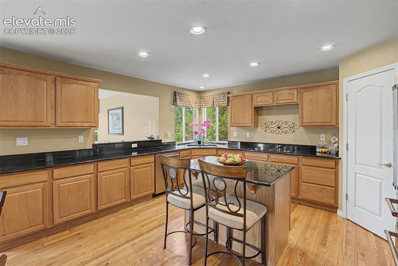 Granite Countertops and an Abundance of Cabinets!