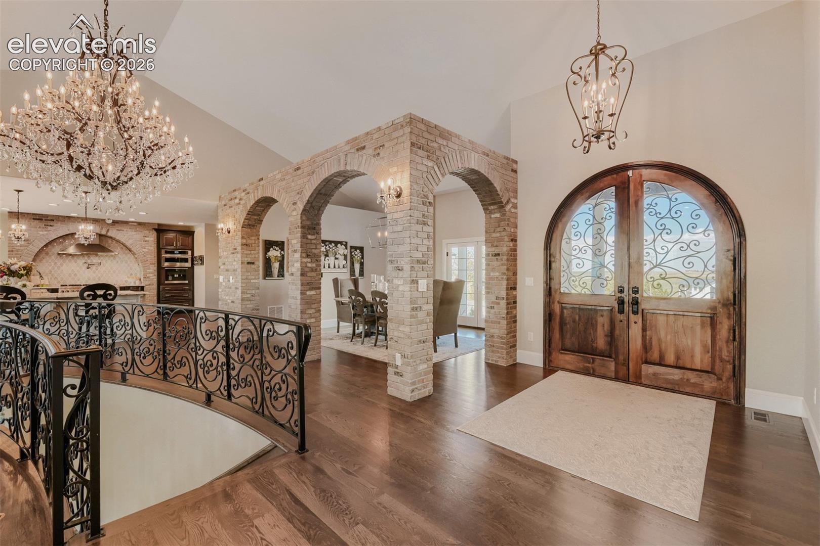 Beautiful hardwood and arches throughout