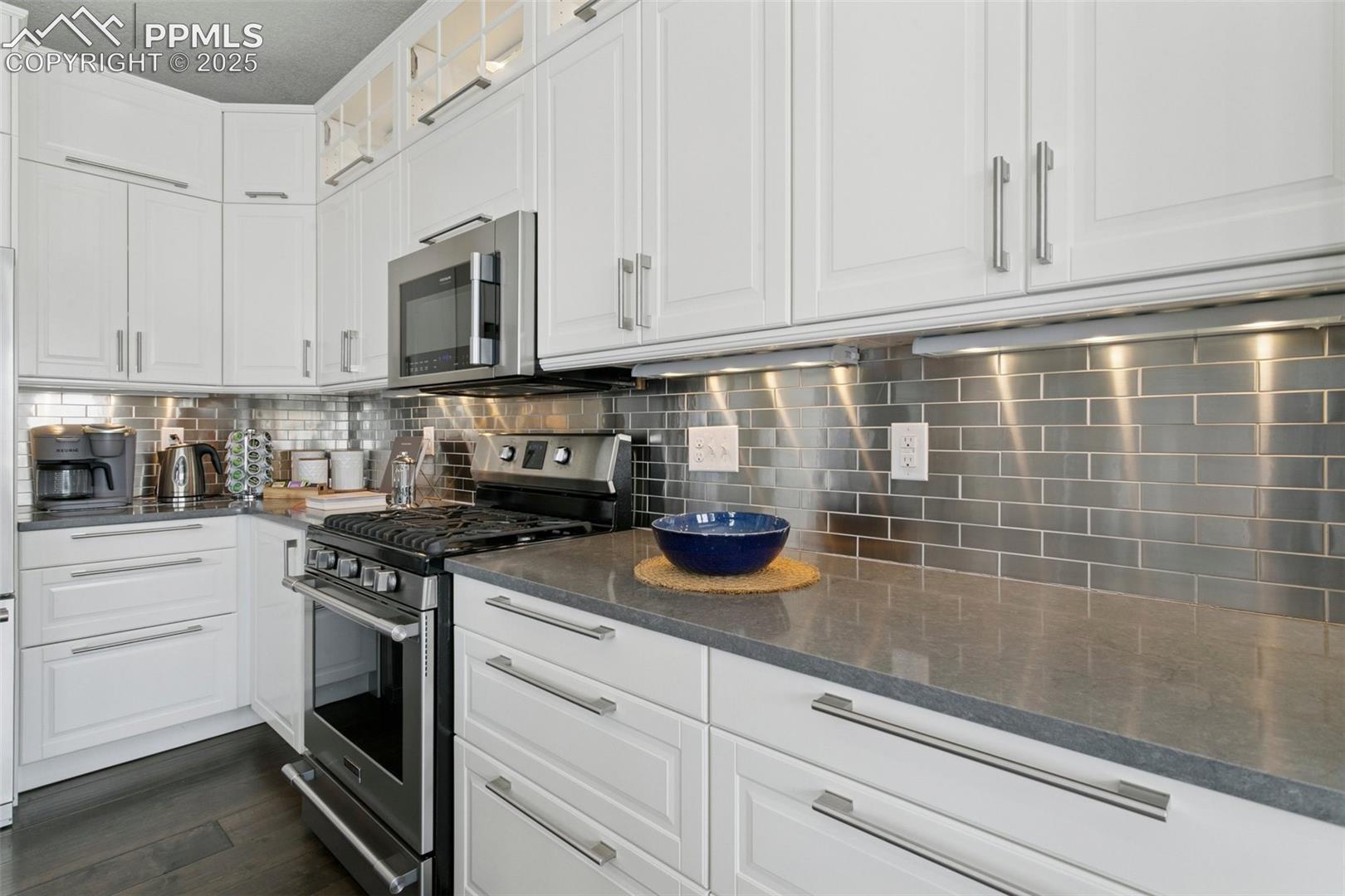 Custom quartz countertops and under-cabinet lighting w/dimmer capability!