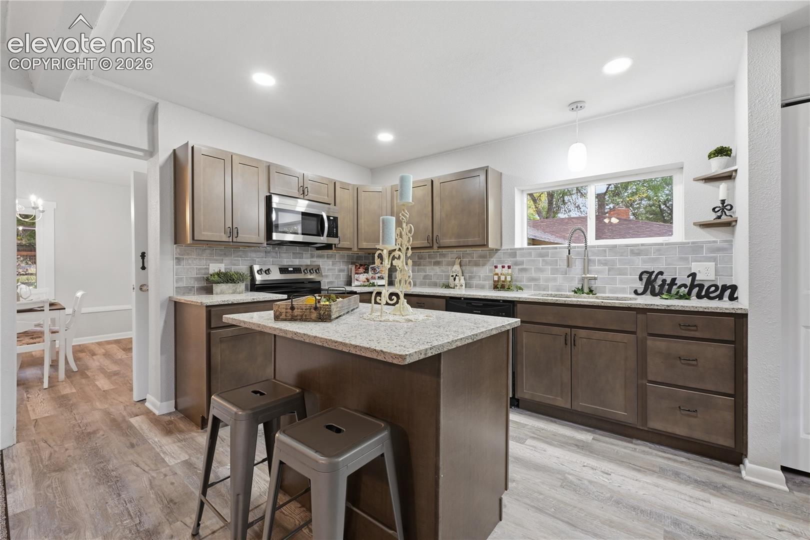 A fully remodeled kitchen! All new cabinets, slab granite countertops and all new stainless steel appliances.