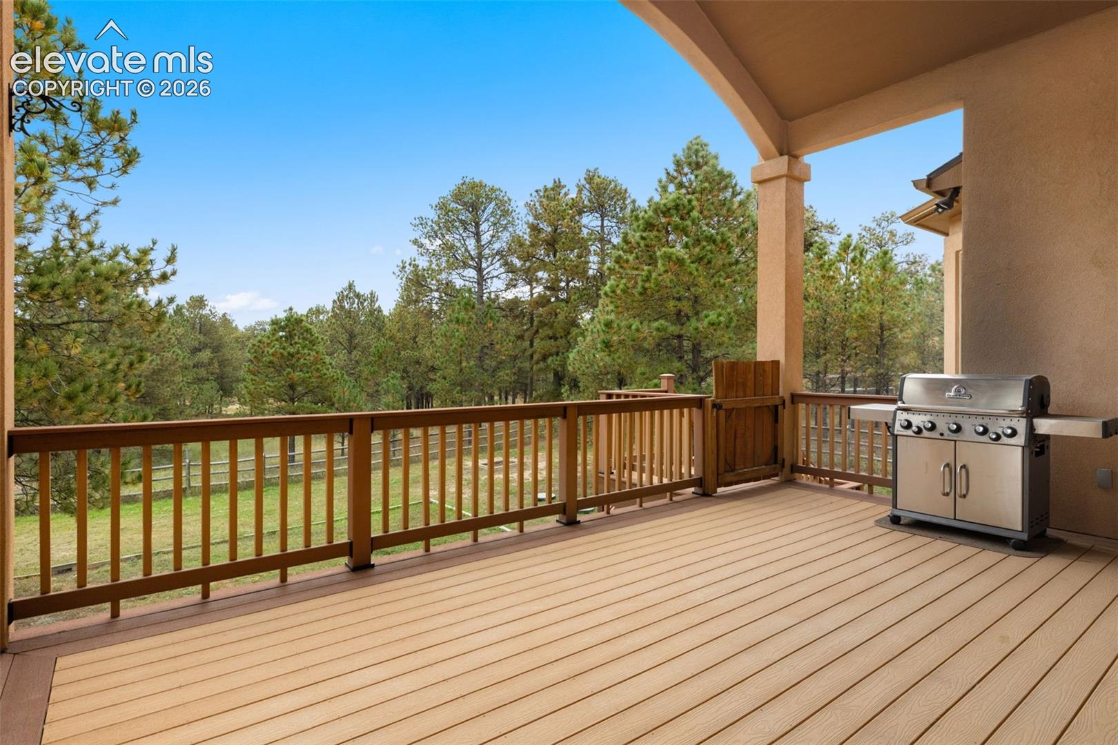 Covered deck in the rear of the house