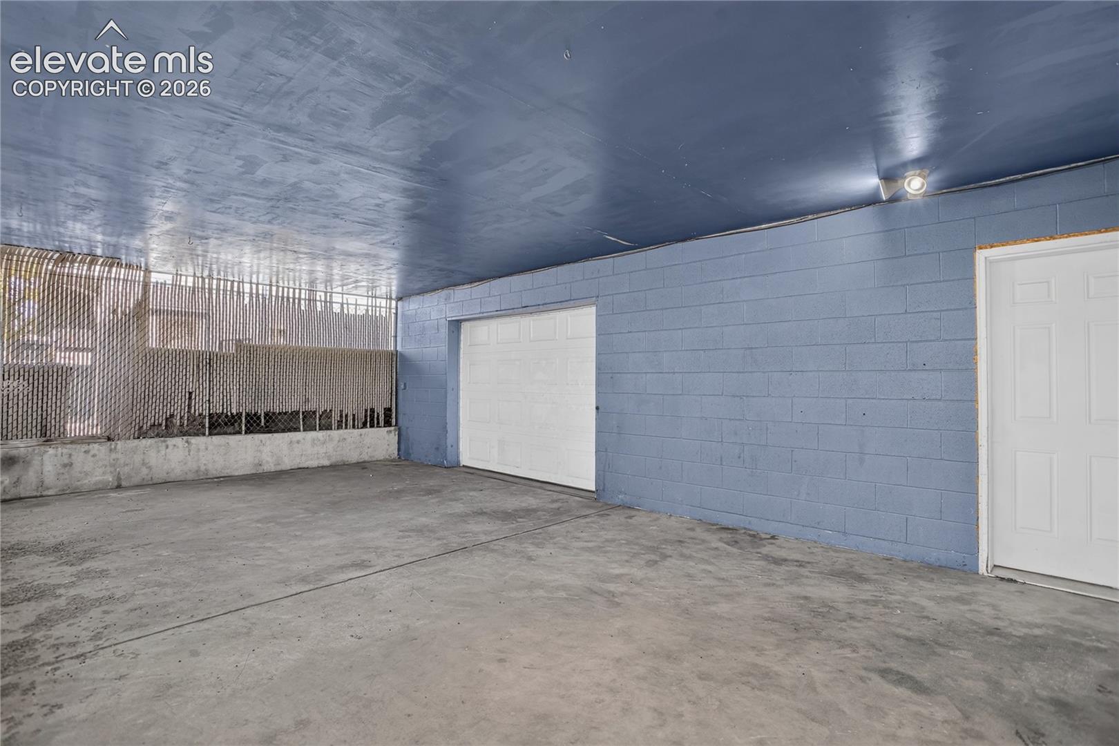 Dual garage door access to back of building