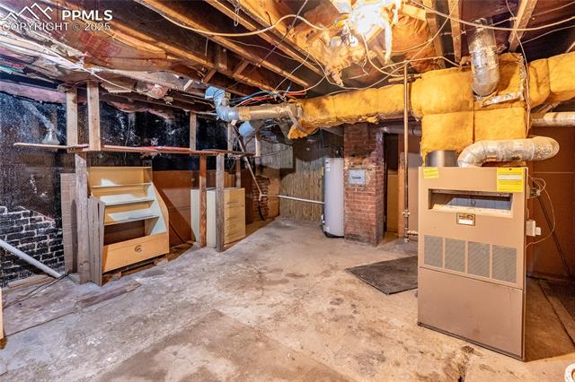 Unfinished basement with water heater
