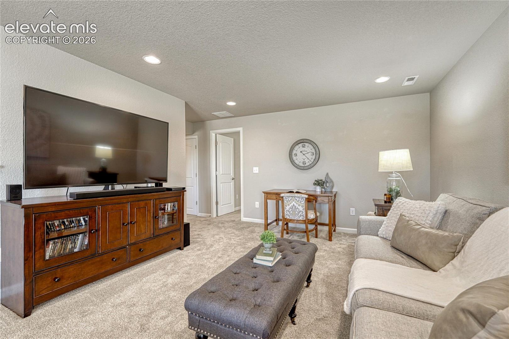 This versatile basement area can easily adapt to your lifestyle as a media room, home office, fitness space, or additional family room.