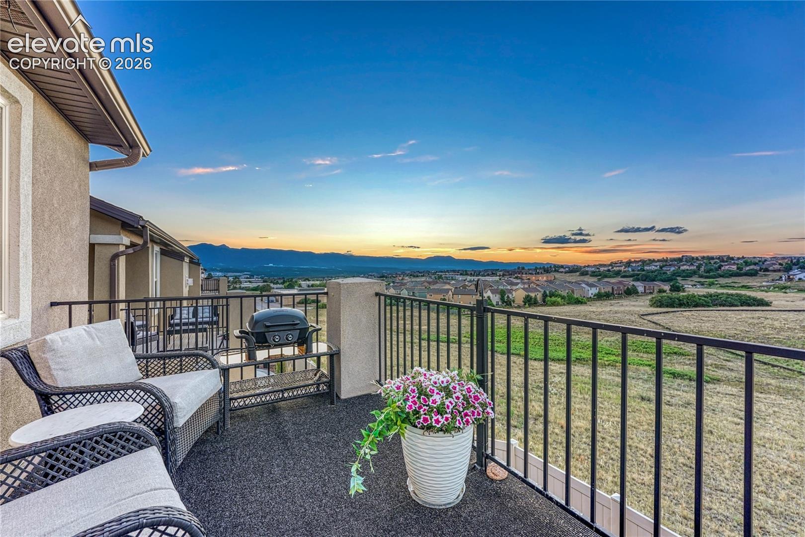 Take in breathtaking mountain views and unforgettable sunsets from this elevated composite patio, creating the perfect backdrop for outdoor gatherings.