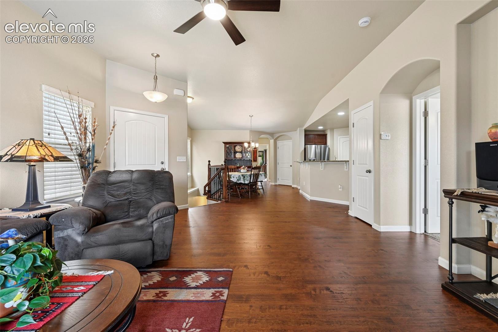 View from Living room to dining area and kitchen