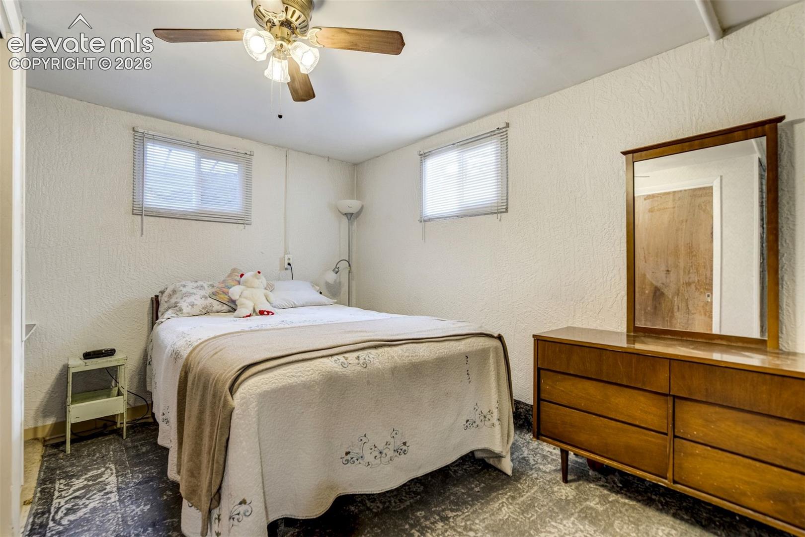 Generously sized non-conforming basement bedroom.