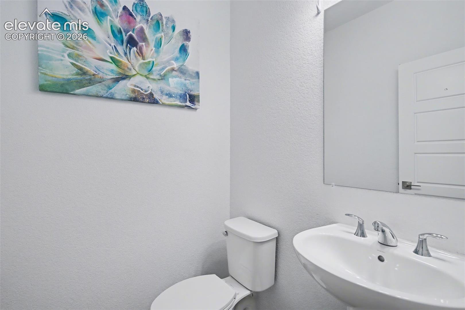 Bathroom with toilet and a sink