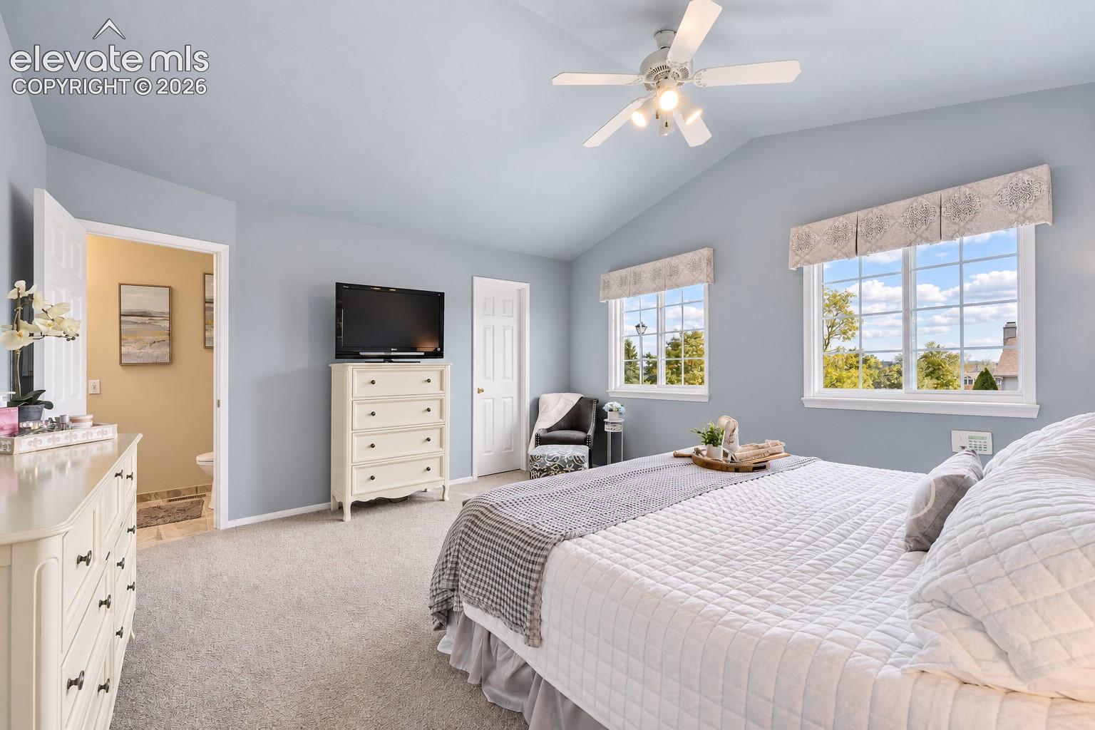 The Primary Bedroom has an adjoining bathroom and walk in closet.