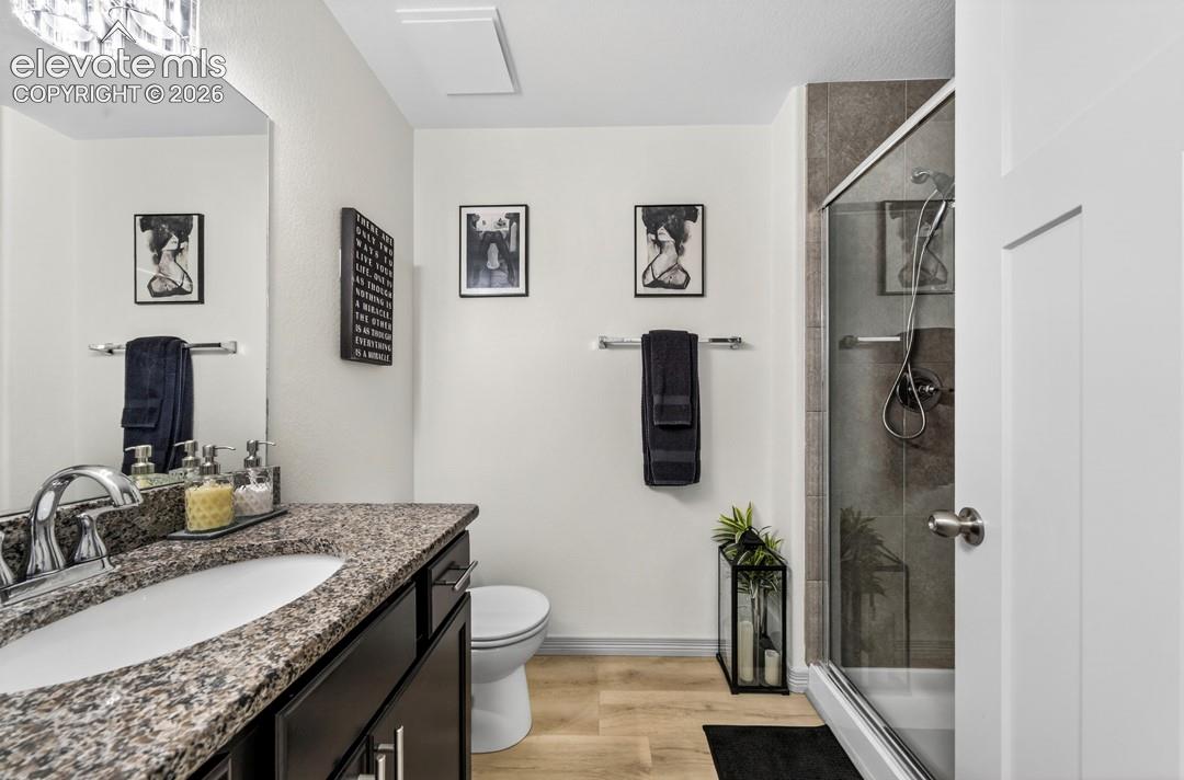 Main level, granite, tile shower w/ built-in bench