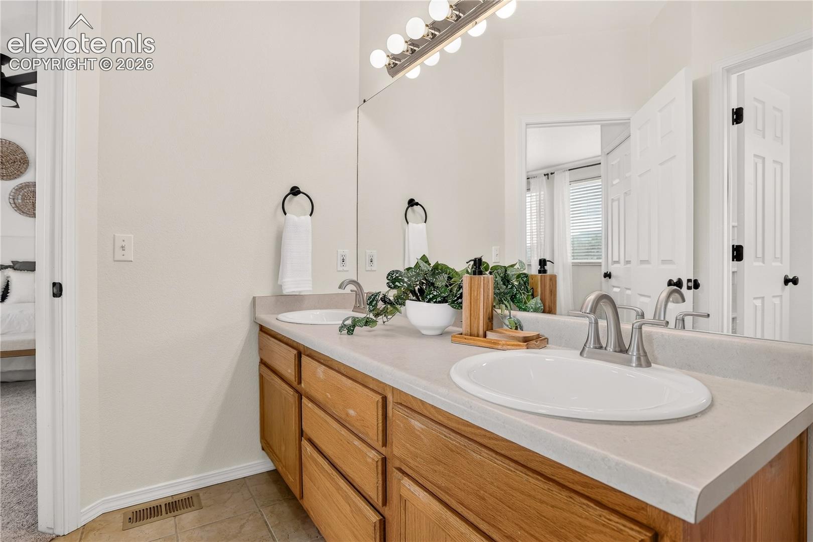 Master bathroom with double vanity. 