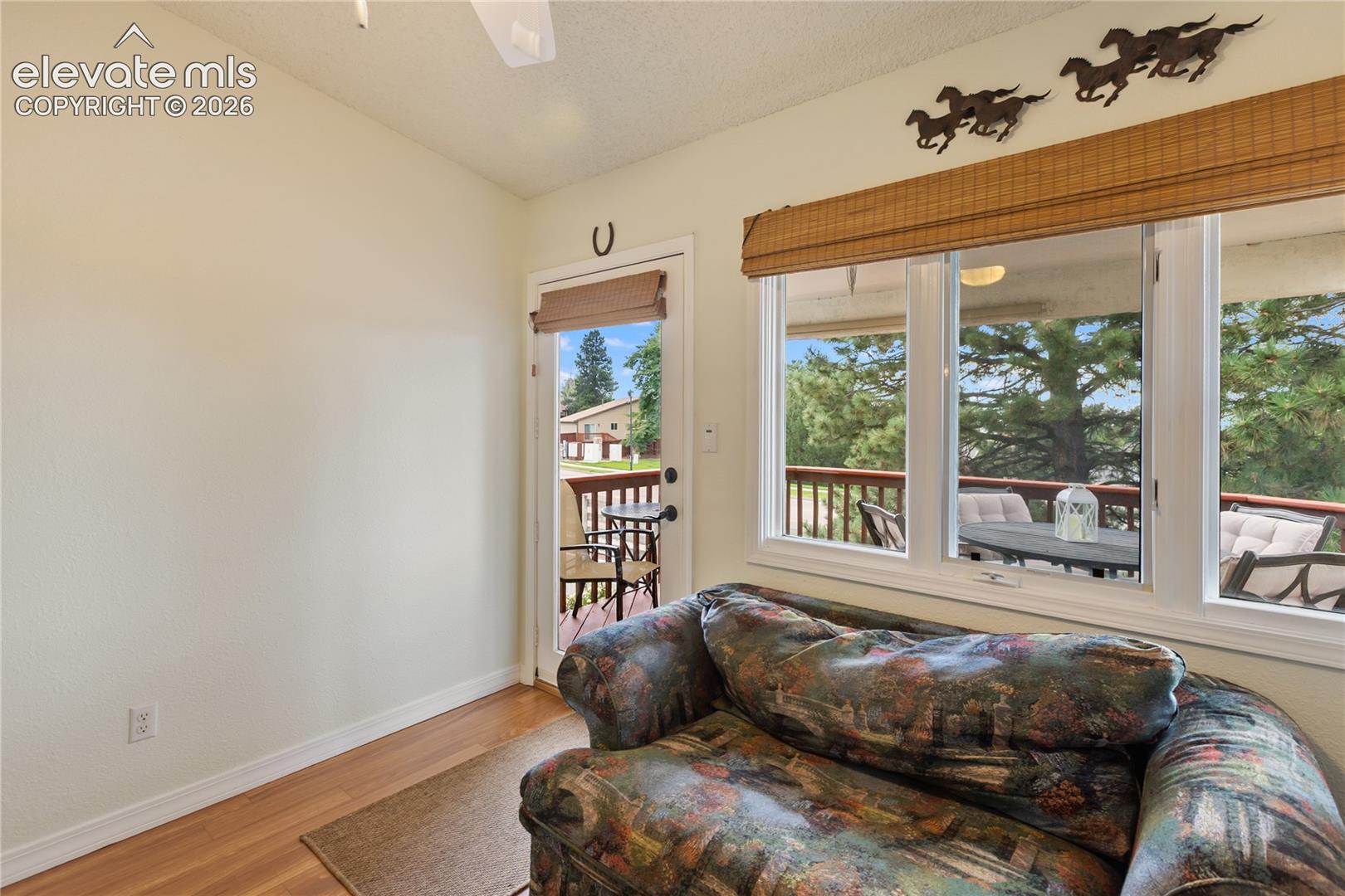 This bonus room/office has great views and walks out to the covered deck. 