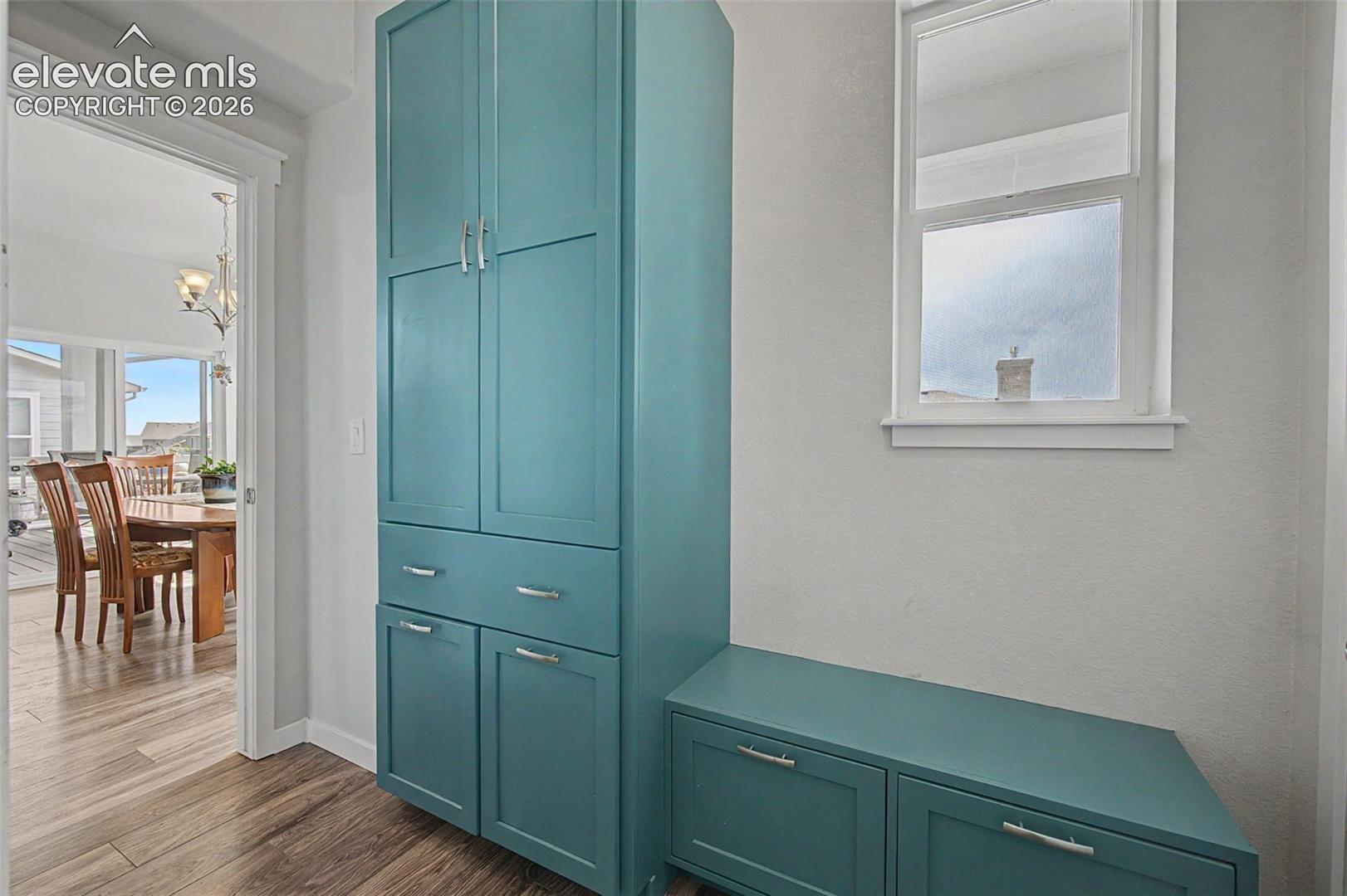 Step into this custom mud room from the 3-car garage where you can store all of your outdoor items.