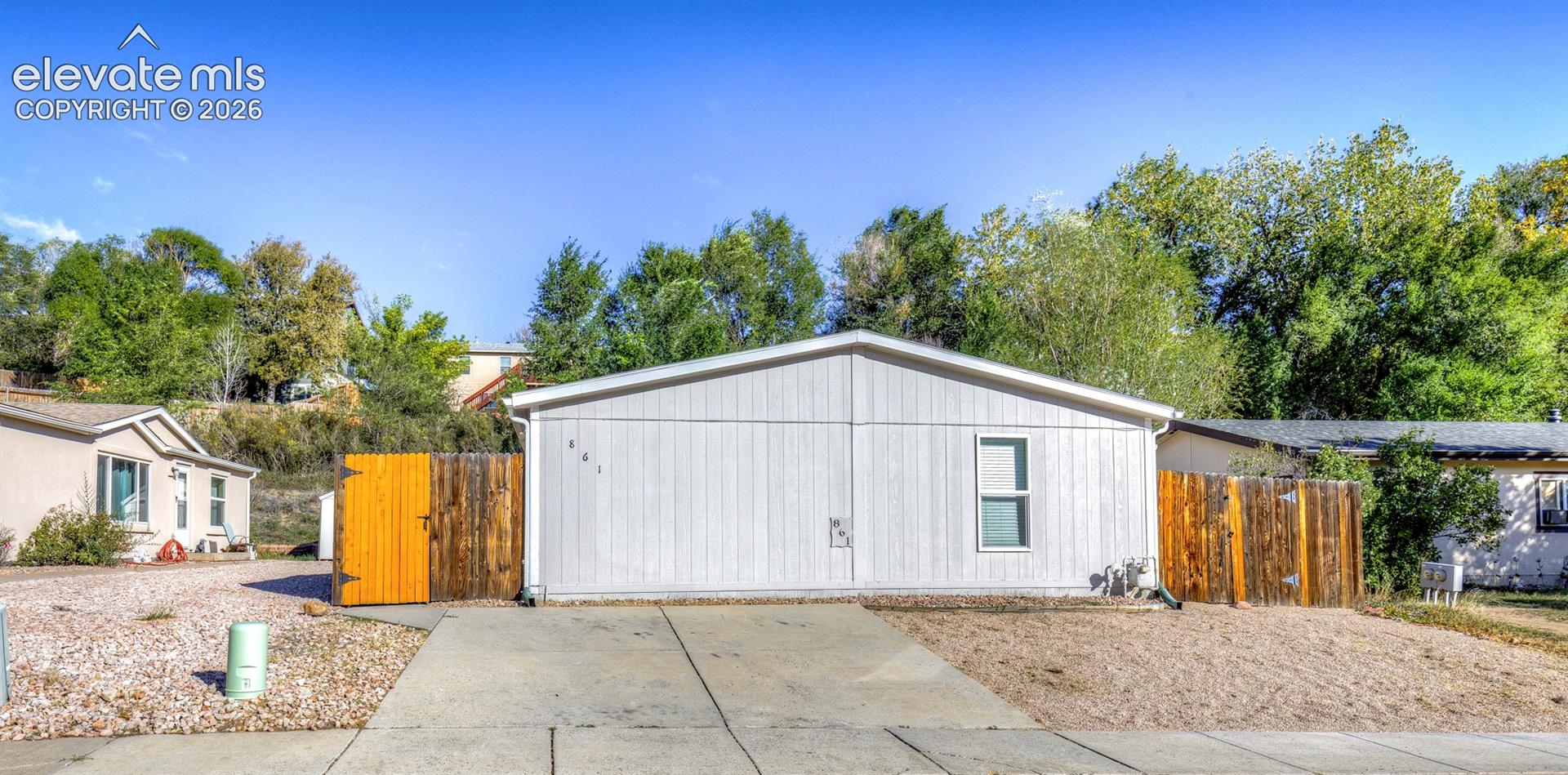 Welcome home to this charming 3-bedroom, 2-bathroom property situated on a spacious lot in a desirable cul-de-sac location! Enjoy beautiful views of the Front Range and Pikes Peak, along with a fenced backyard and a large storage shed. The thoughtfully designed layout offers privacy and comfortable living, with the primary suite featuring a spacious bathroom and walk-in closet. Two additional bedrooms and a full bathroom are conveniently located on the opposite side of the home. The inviting living room is filled with natural light and features a cozy fireplace, perfect for relaxing on chilly winter evenings. The kitchen offers plenty of space for a dining table, while the back laundry area provides convenient access to the backyard. Recent updates include new wood laminate flooring throughout and fresh interior paint. The roof is also being replaced, offering an added benefit for the next owner. Enjoy the convenience of off-street parking for guests, plus a location close to military bases, schools, shopping, restaurants, grocery stores, hiking trails, public transportation, Fountain Creek Regional Park, and the local fire station. With its spacious yard, practical layout, mountain views, and convenient location, this home offers a wonderful opportunity to enjoy comfortable living in Fountain, Colorado!