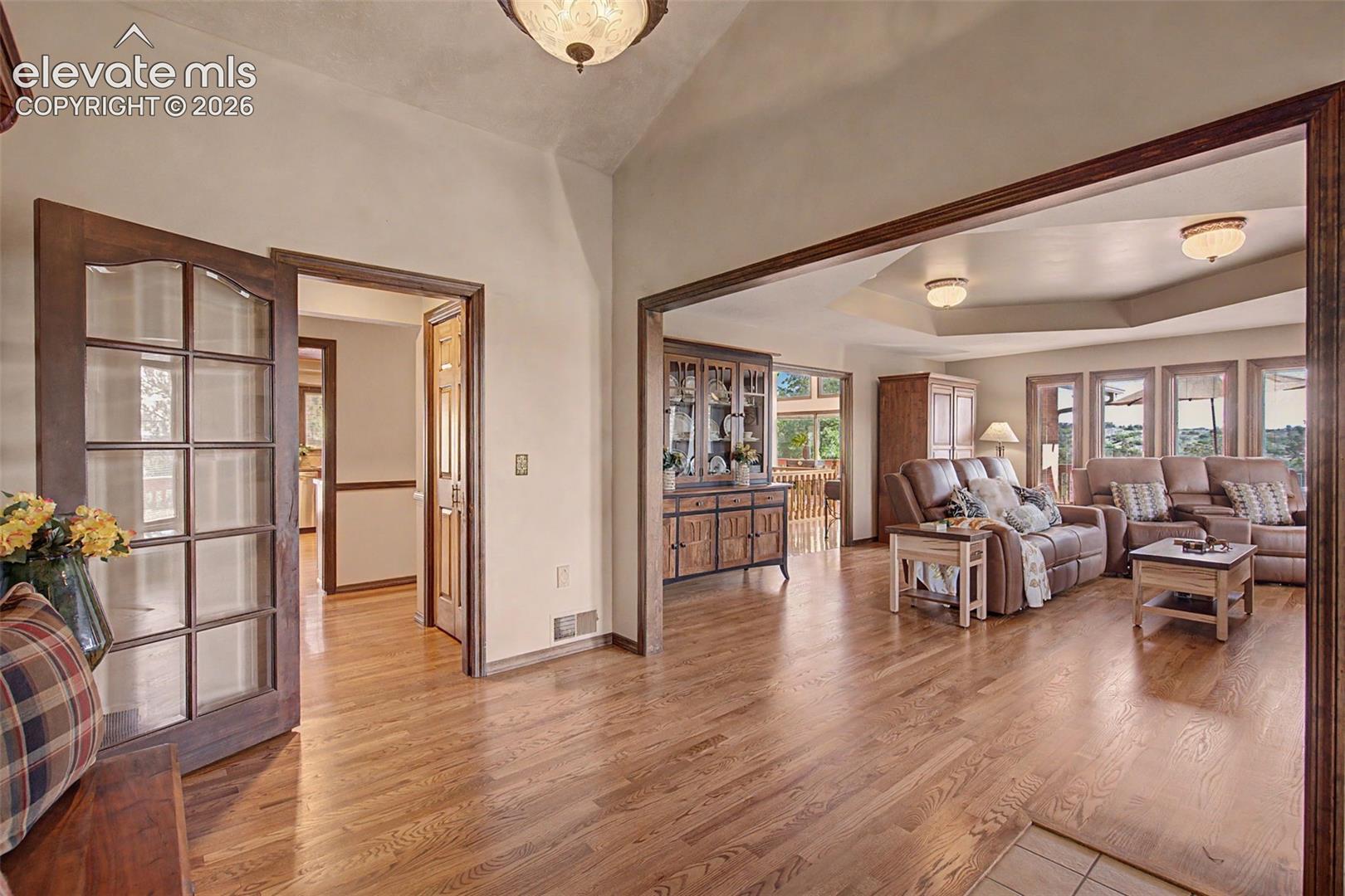 Note the gorgeous site-finished hardwood floors.