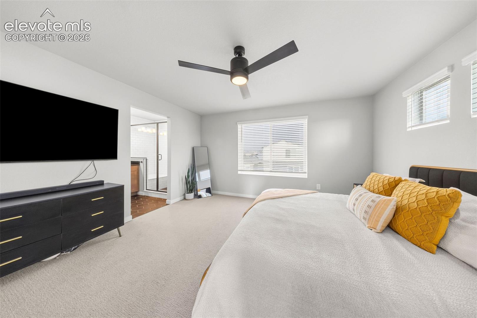 The primary bedroom is HUGE with lots of natural light and an ensuite bath. 