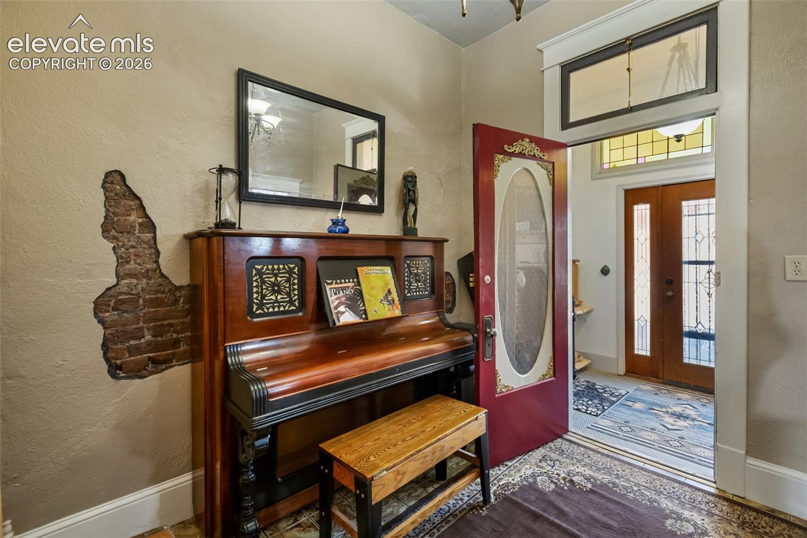 this is the "foyer" or "piano room" you enter it from the Entry (door from entry is open) from it you may enter the second bedroom, or the living room.