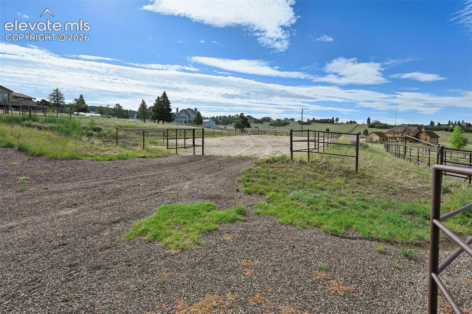 Riding arena with crushed granite footing
