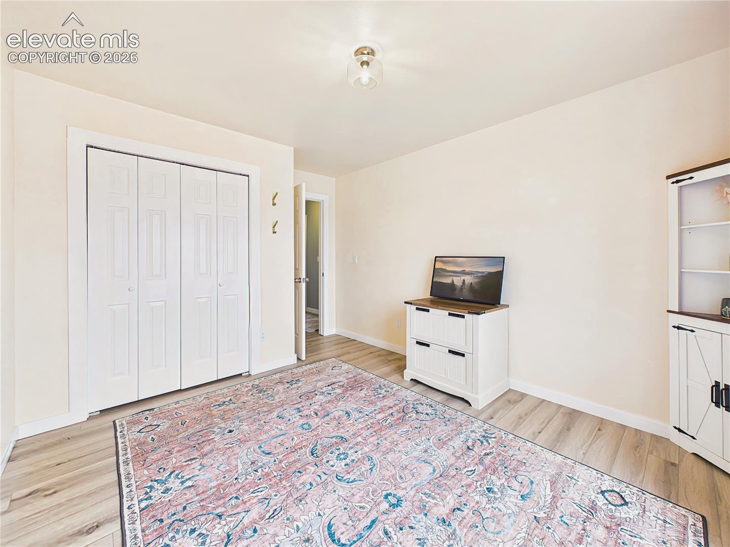 Versatile Main level bedroom 3 provides generous space for guests, a home office, or hobby room.