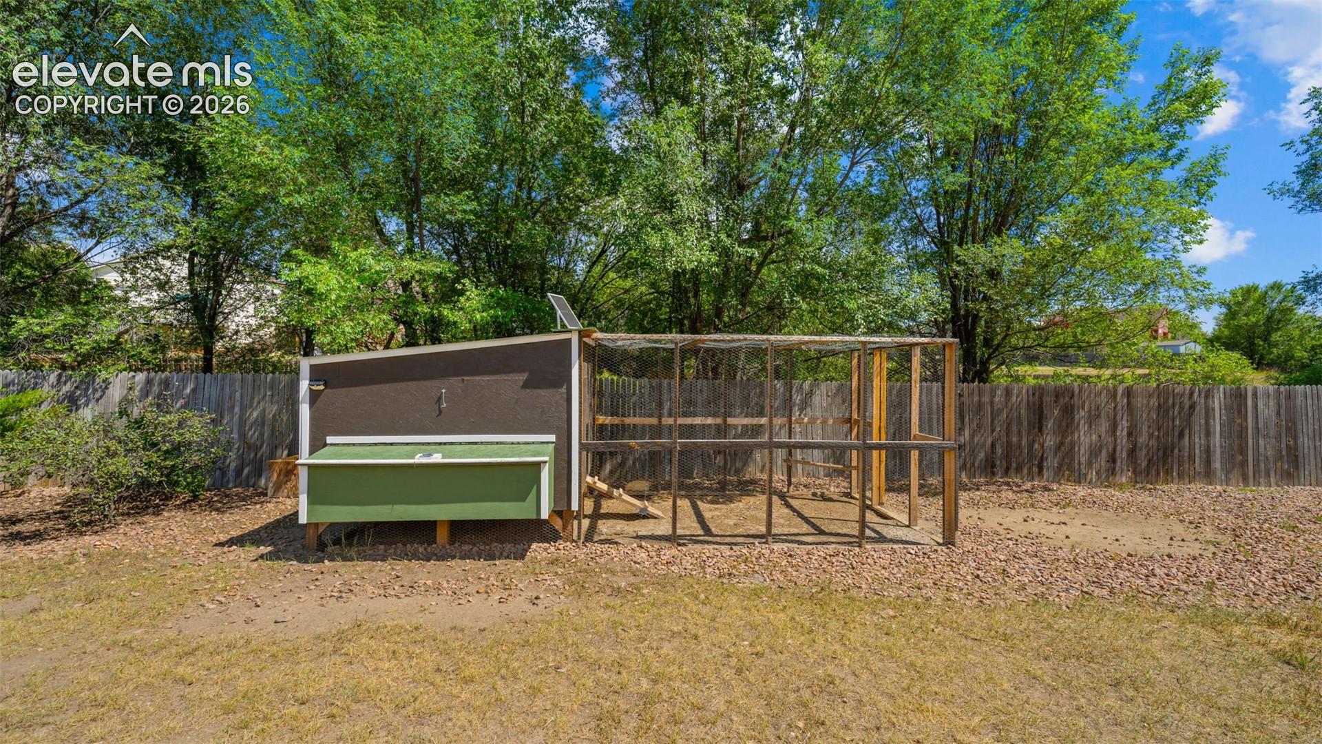 Chicken coop included!