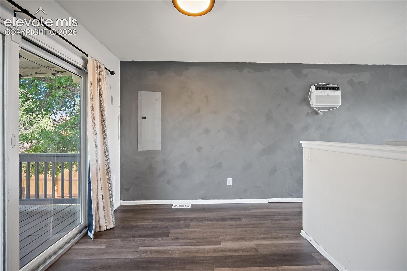 Dining area off kitchen with a view of the deck