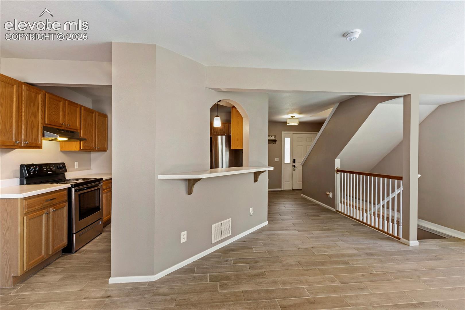 Beautiful open floor plan. Kitchen open on both sides.